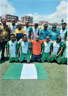Consul-General with the Nigerian team during a football march competition against Cote’d Ivoire